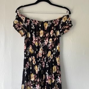 Black floral romper with open skirt